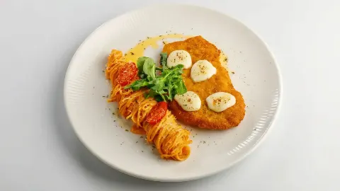 Шницель с пастой «Aglio e Olio»